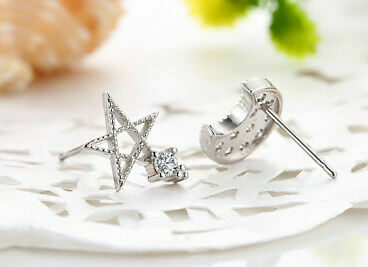 Cercei decorați cu zirconii albe